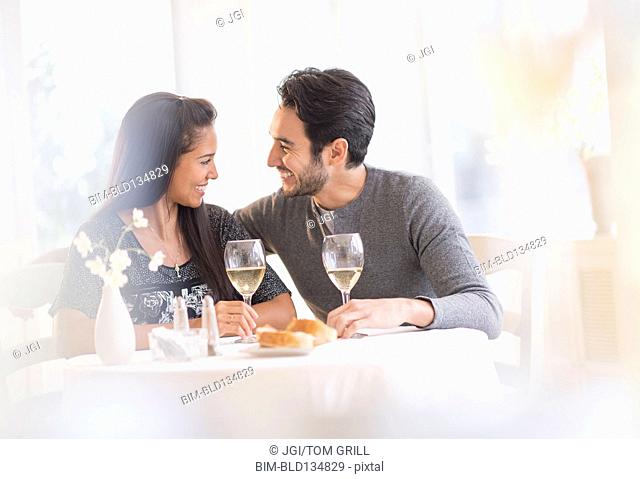 Couple having dinner together in restaurant