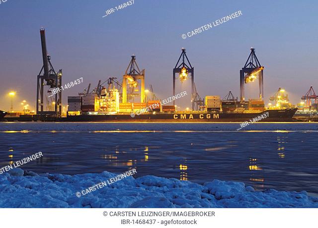 A container ship is unloaded in the port of Hamburg, Burchardkai terminal, Hamburg, Germany, Europe