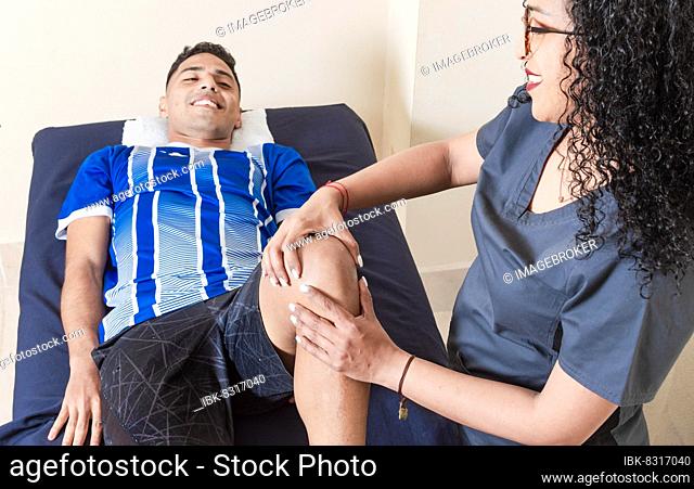 Knee rehabilitation physiotherapy, female doctor with patient undergoing knee treatment