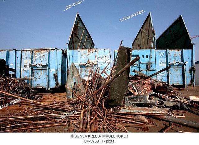 Metal parts and open containers in the scrapyard