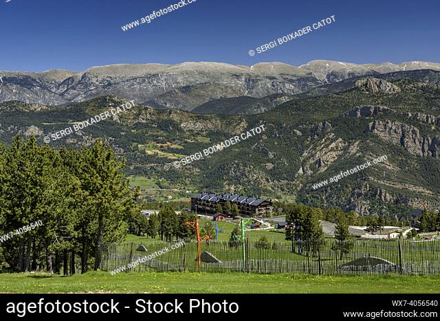 Port del Comte ski resort in spring, with the Cadí mountain range in the background (Lleida, Catalonia, Spain, Pyrenees)