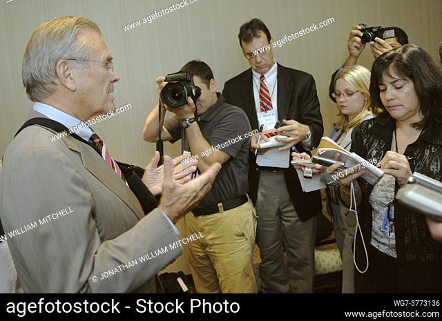 NICARAGUA Managua -- 02 Oct 2006 -- The fall guy. . . File photo of former US Secretary of Defense Donald Rumsfeld (left) responds to a reporter’s question...