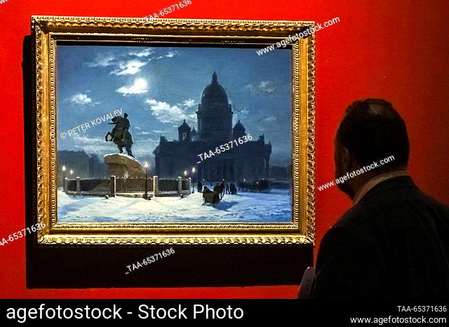 RUSSIA, ST PETERSBURG - NOVEMBER 30, 2023: A visitor looks at A View of a Monument to Peter I on the Senate Square in St Petersburg (1870) displayed as part of...