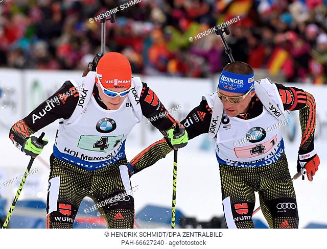 Erik Lesser (R) and Benedikt Doll of Germany in action during the Men's 4x7.5 km relay competition at the Biathlon World Championships