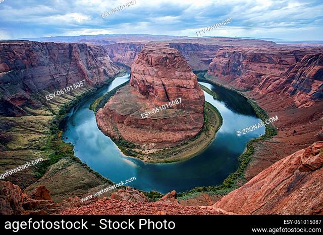 The famous Horseshoe Bend, located in Page, Arizona. Shot in the late fall as a thunderstorm was approaching, making for a dramatic sky