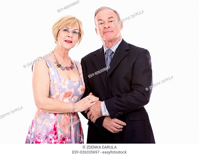 retired couple dressed up on white isolated background