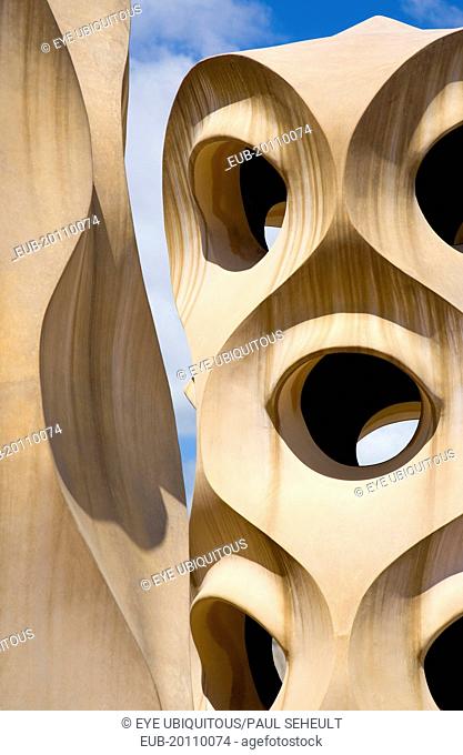 Chimneys and vents on the roof of Casa Mila apartment building known as La Pedrera or Stone Quarry designed by Antoni Gaudi in the Eixample district