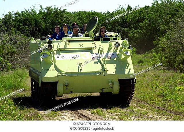 03/18/2002 -- STS-110 Mission Specialist Ellen Ochoa practices driving the M-113 armored personnel carrier, part of Terminal Countdown Demonstration Test...