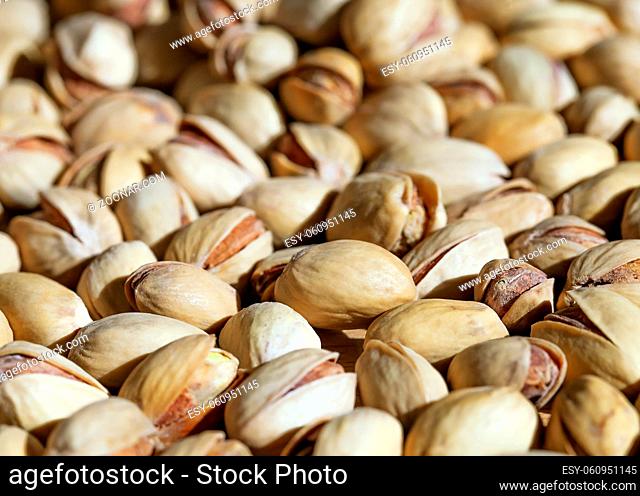 Close up of fresh pistashio nuts, background