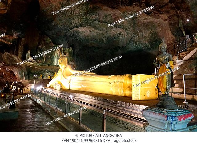 04 March 2019, Thailand, Takua Thung: A Buddha statue in the largest cave (""Tham Yai"") of Wat Suwan Kuha, also called Wat Tham (""cave temple"")