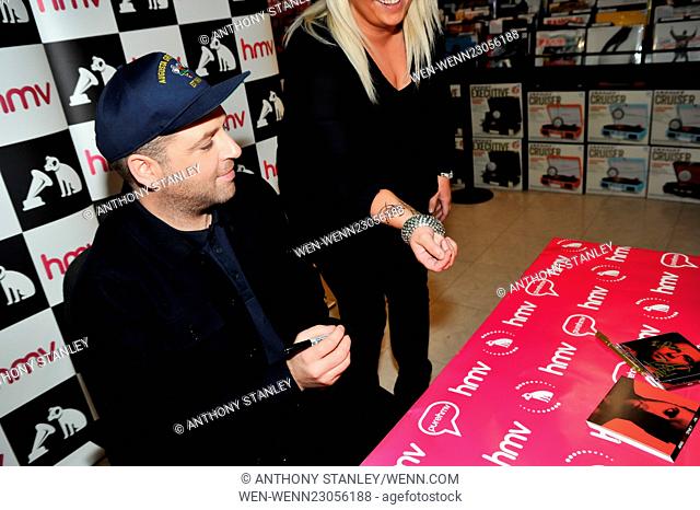 Markus Feehily signs his new album 'Fire' for mega-fan Donna Scott and signs her wrist so she can have it tattooed alongside her Shane Filan tattoo