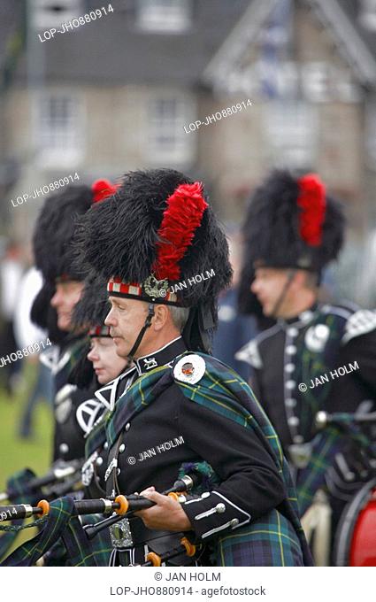 Scotland, Aberdeenshire, Strathdon, Pipers at the Lonach Gathering and Highland Games, billed as , ÄòScotland's friendliest Highland Games