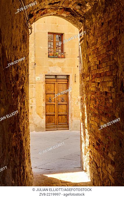 The narrow streets of Pienza, Tuscany. The town was declared a World Heritage Site by UNESCO in 1996. It lies within the Val d'Orcia which has also been...