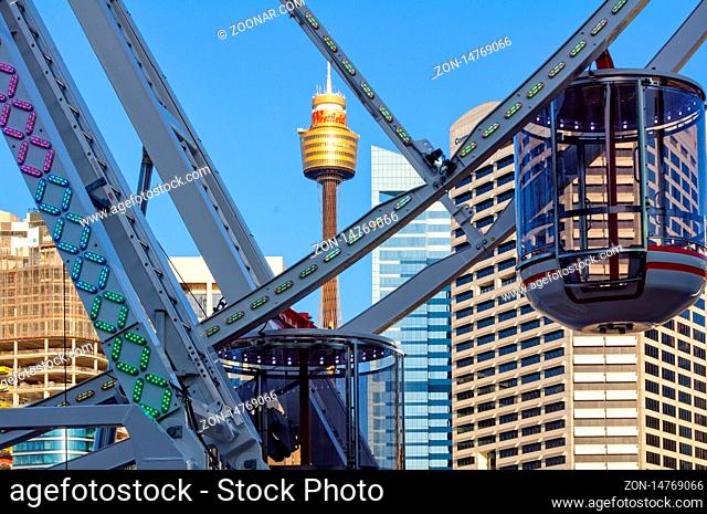 The Darling Harbour Ferris Wheel and the Sydney Tower - Sydney, NSW, Australia