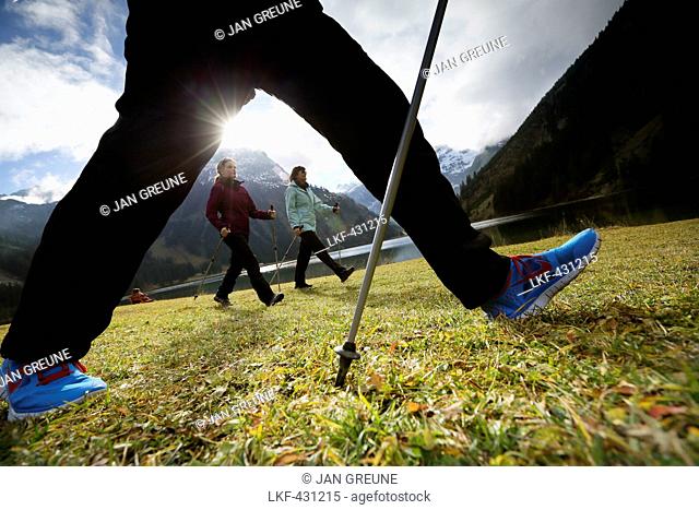 Nordic Walkers at lake Vilsalpsee, Tannheim, Tannheim Valley, Tyrol, Austria