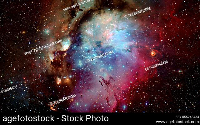 Abstract bright colorful universe. Nebula night starry sky in rainbow colors. Multicolor outer space. Elements of this image furnished by NASA