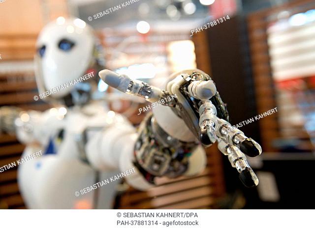 Robot AILA stands with outstretched fingers at CeBIT, the world's largest computer expo, in Hanover, Germany, 04 March 2013
