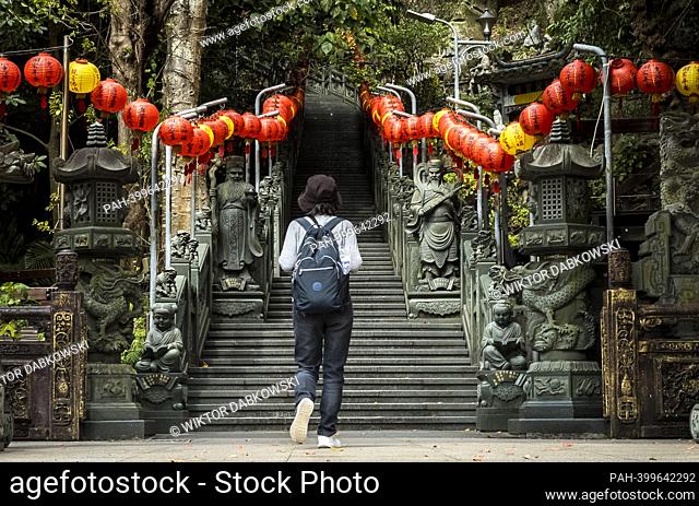 A woman climbs the stairs in Zhishan Park in in Taipei, Taiwan on 14/03/2023 by Wiktor Dabkowski. - Taipei/Taipei/China
