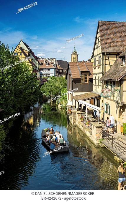Timbered houses and canal with excursion boat, Little Venice, La Petite Venise, Colmar, Alsace, France