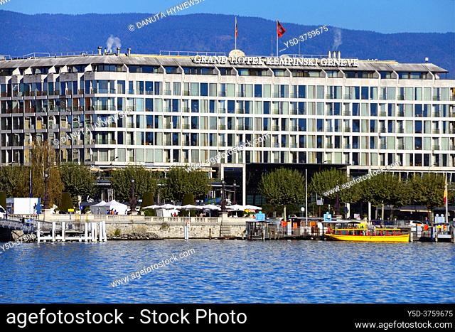 Waterfront luxury five-star Grand Hotel Kempinski, Quai du Mont-Blanc, Jura mountains (in France) in background, Geneva, Switzerland, Europe
