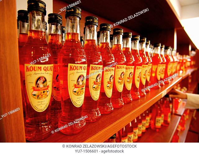 Kumquat liqueur bottles in Mavromatis factory shop on greek island of Corfu