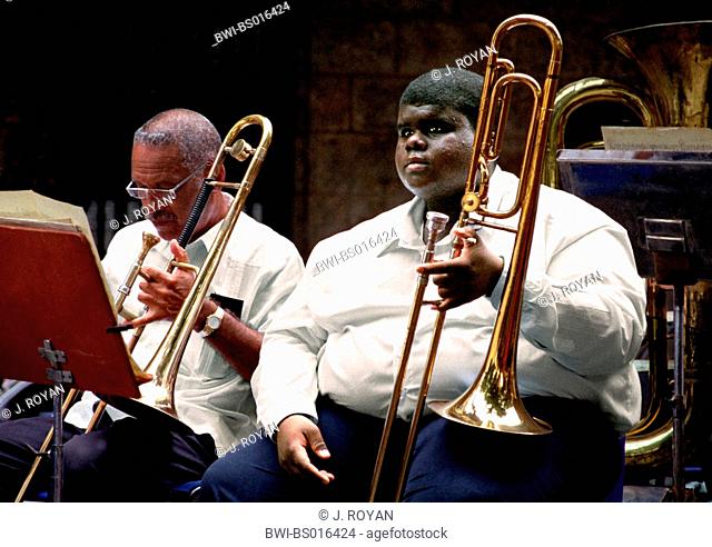 two trombonists at the rehearsal, Cuba