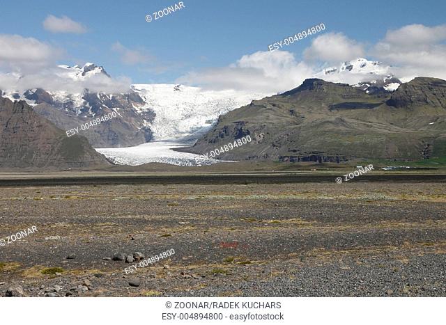 Hvannadalshnúkur and Svínafellsjökull. Hvannadalshnúkur 2110m is the highest peak in Iceland. Svínafellsjökull is one of the outlet glaciers glacier tongues of...