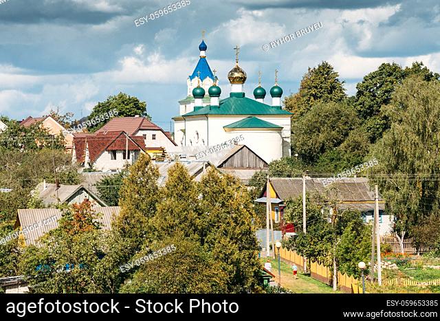 Mir, Belarus. Landscape Of Village Houses And Orthodox Church Of The Holy Trinity In Mir, Belarus. Famous Landmark