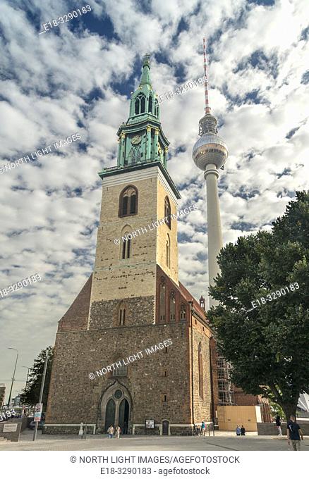 Germany, Berlin. St. Mary Church or Marienkirche with the Berlin TV Tower (Fernsehturm) in the background