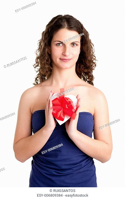 Woman holds a heart shaped box with her hands, isolated in white
