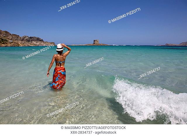Woman at La Pelosa beach, Sardinia, Italy