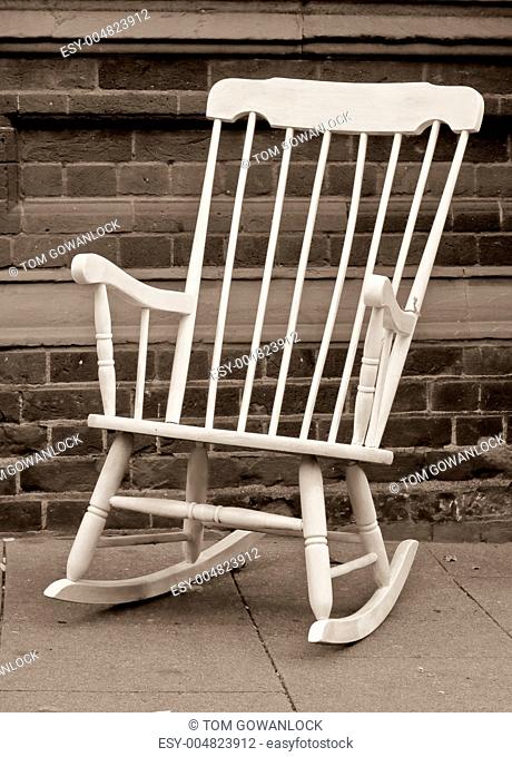 Lovely monochrome image of a white rocking chair
