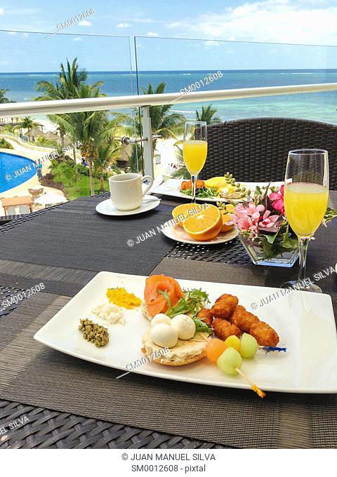 Breakfast on balcony by the sea
