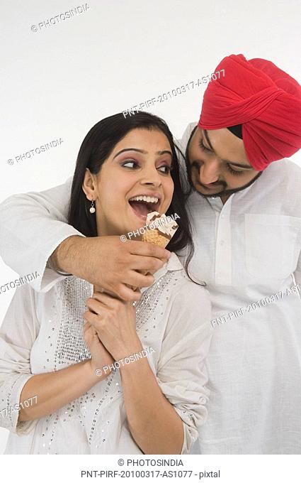 Sikh couple eating ice cream