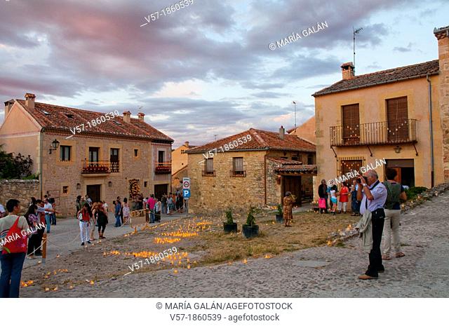 People in the street before Candles Concert, at nightfall. Pedraza, Segovia province, Castilla Leon, Spain