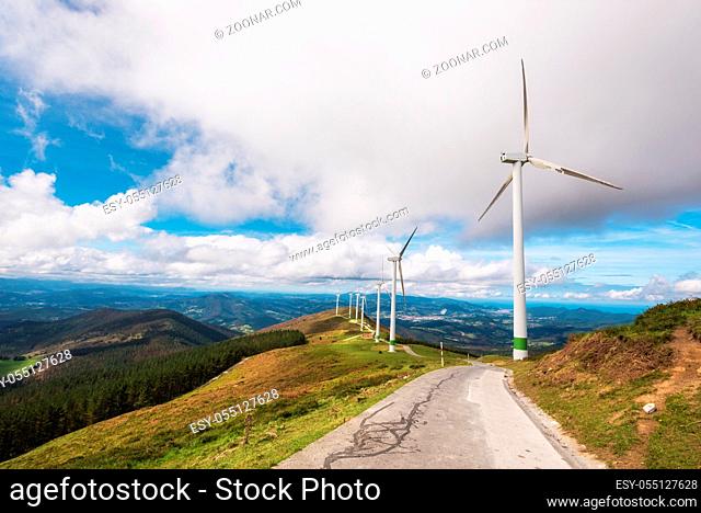 Renewable energy. Wind turbines, eolic park in scenic landscape of basque country, Spain