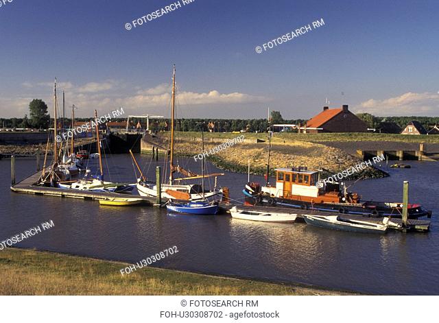 Netherlands, Holland, Groningen, Termunten, Europe, Boats docked in the harbor on the North Sea in Termunten