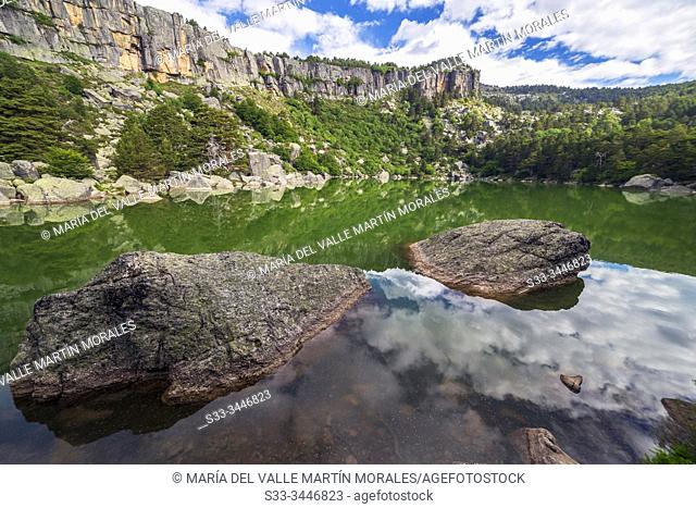 Reflections at The Black Lagoon in Urbion Peaks. Soria. Spain. Europe