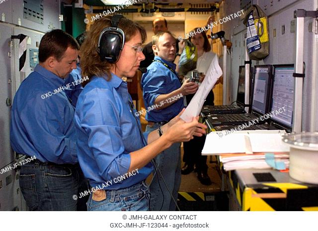 Expedition 18 crewmembers participate in a space station emergency scenarios training session in the Space Vehicle Mockup Facility at NASA's Johnson Space...