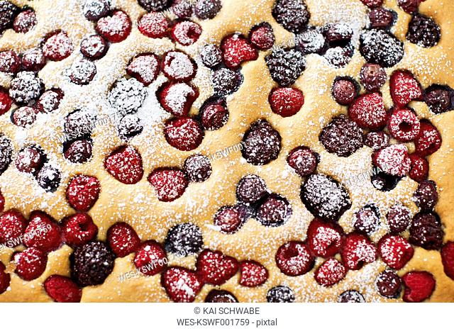 Fruit cake with different berries, close-up