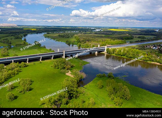 Germany, Saxony-Anhalt, Hohenwarthe, a barge crosses the Magdeburg waterway intersection, the Mittelland Canal leads here in a trough bridge over the Elbe