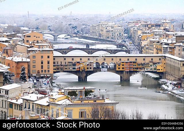 Ponte Vecchio or Old Bridge Florence Italy with snow panorama Tuscany