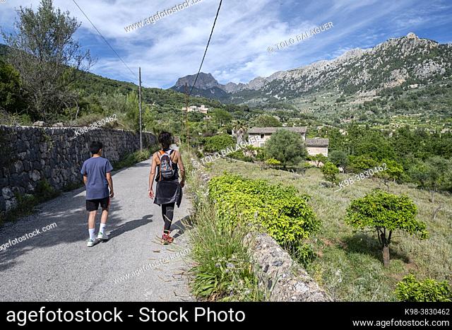 two hikers on the way, Binibassí, Soller valley route, Mallorca, Balearic Islands, Spain