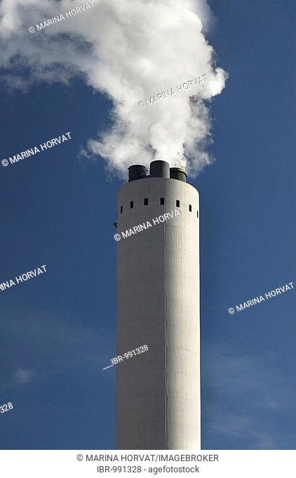 Industrial chimney spouting smoke into the sky, climate change, environmental pollution