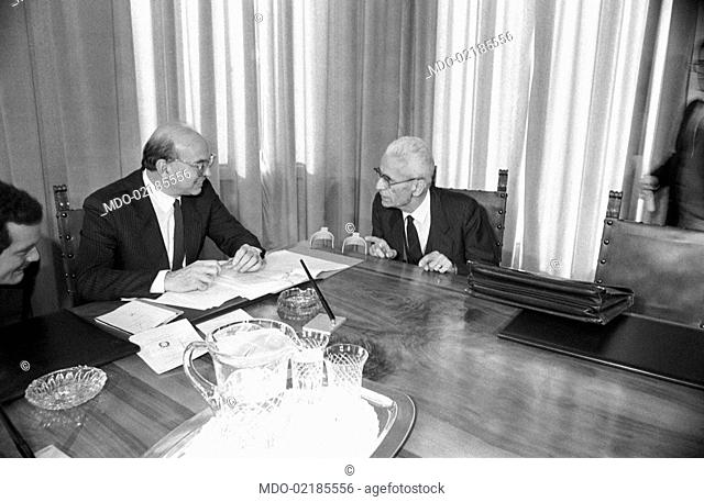 Italian President of Autonomous Province of Bolzano Silvius Magnago talking to the President of the Council of Ministers of the Italian Republic Bettino Craxi...
