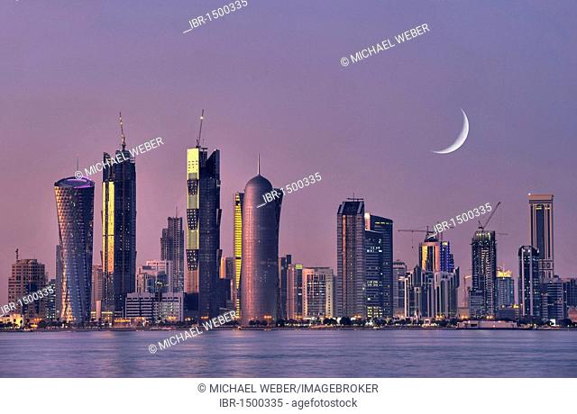 Twilight shot, skyline of Doha, Tornado Tower, Navigation Tower, Peace Towers, Al-Thani Tower, Moon, Doha, Qatar, Persian Gulf, Middle East, Asia