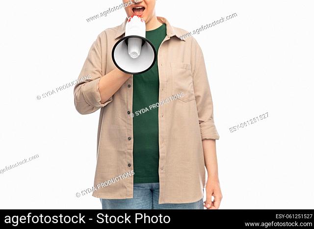 woman with megaphone protesting on demonstration