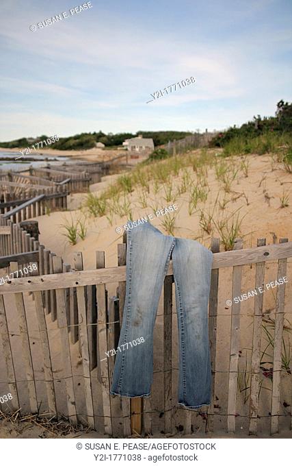 Jeans drying on a fence on Breakwater Beach, Brewster, Cape Cod, Massachusetts