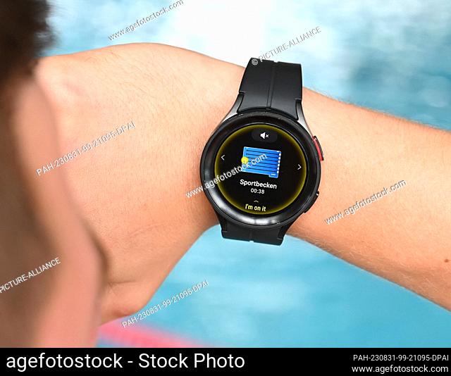 PRODUCTION - 28 August 2023, Baden-Württemberg, Freudenstadt: At the Panorama pool in Freudenstadt, a smartwatch is on display which