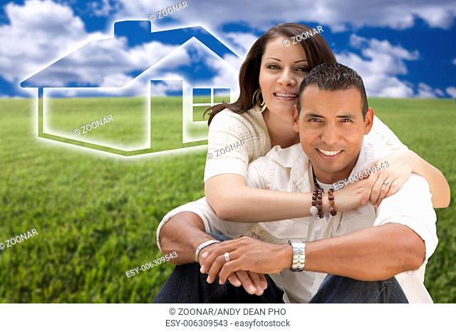 Hispanic Couple Sitting in Grass Field with Ghosted House Behind